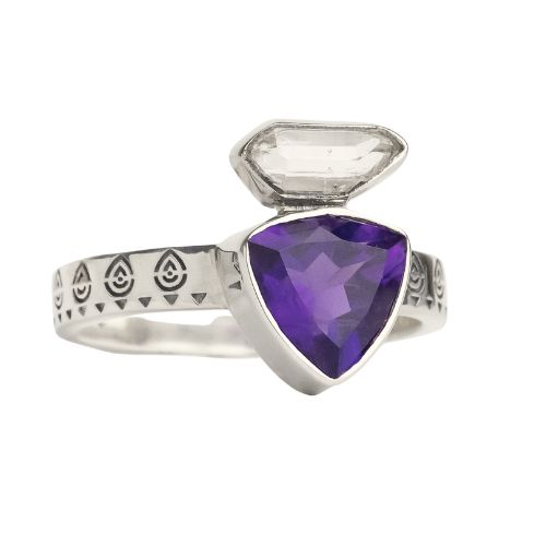 Beautiful ring featuring a faceted Amethyst topped with a Herkimer Diamond and set into high polish sterling silver band. Available for wholesale from woman-owned conscious artisan jewelry importer.