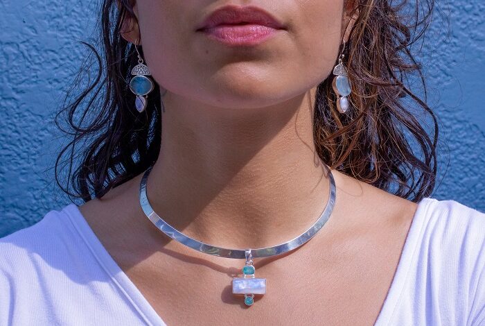 Woman wearing a moonstone necklace
