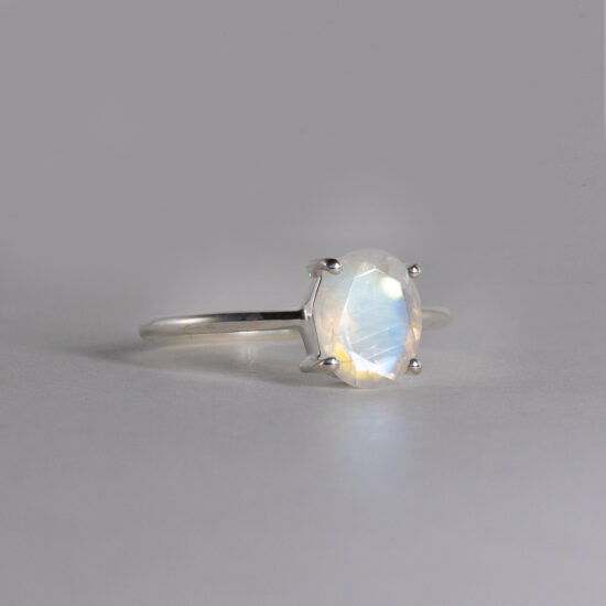 Ring with rainbow moonstone oval